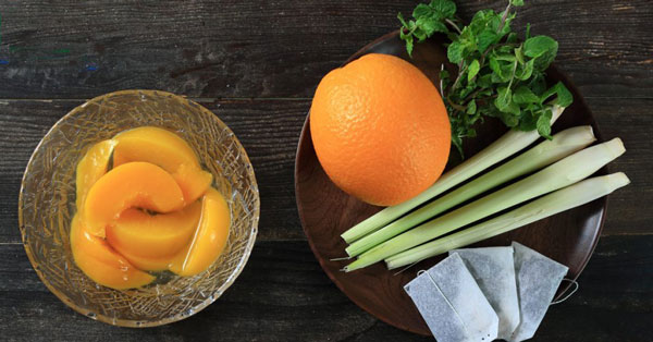 Ingredients for a cup of peach orange lemongrass tea